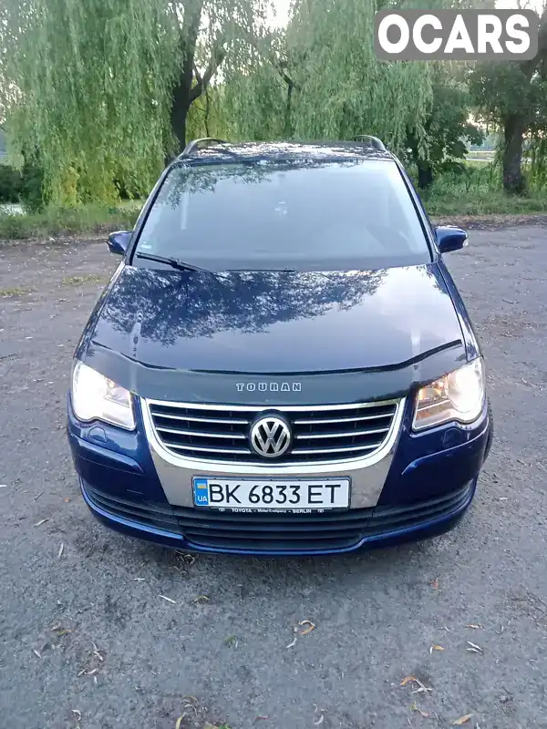 Мінівен Volkswagen Touran 2009 1.39 л. Ручна / Механіка обл. Рівненська, Млинів - Фото 1/21