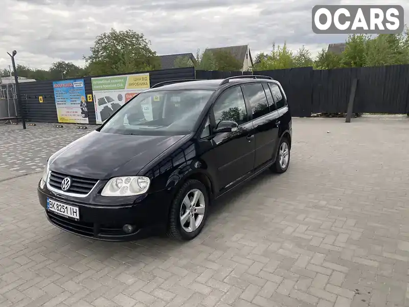 Мінівен Volkswagen Touran 2004 1.6 л. Ручна / Механіка обл. Хмельницька, Шепетівка - Фото 1/10