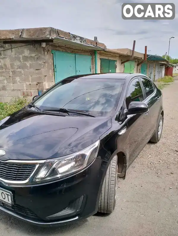 Седан Kia Rio 2013 1.4 л. Ручная / Механика обл. Донецкая, Покровск (Красноармейск) - Фото 1/15