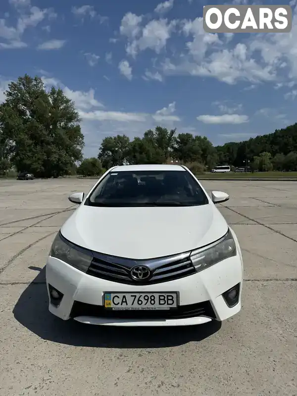 Седан Toyota Corolla 2013 1.6 л. Автомат обл. Черкаська, Канів - Фото 1/12