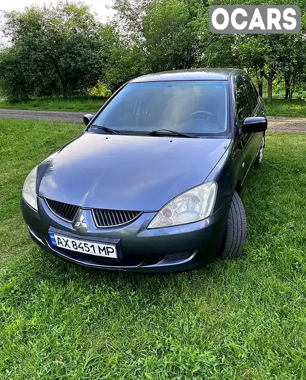 Седан Mitsubishi Lancer 2004 1.6 л. Ручна / Механіка обл. Харківська, Харків - Фото 1/21