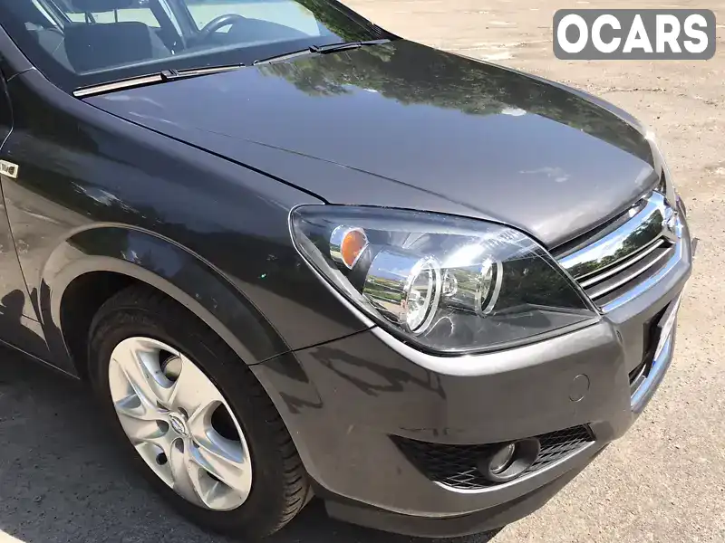 W0L0AHL48C2056011 Opel Astra 2012 Хетчбек 1.6 л. Фото 1