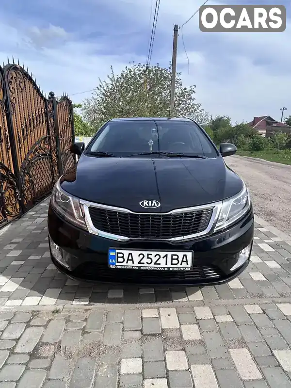 Седан Kia Rio 2013 1.4 л. Автомат обл. Кіровоградська, Знам'янка - Фото 1/12