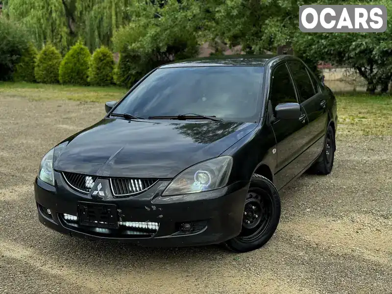 Седан Mitsubishi Lancer 2004 1.6 л. Ручна / Механіка обл. Чернівецька, Чернівці - Фото 1/21