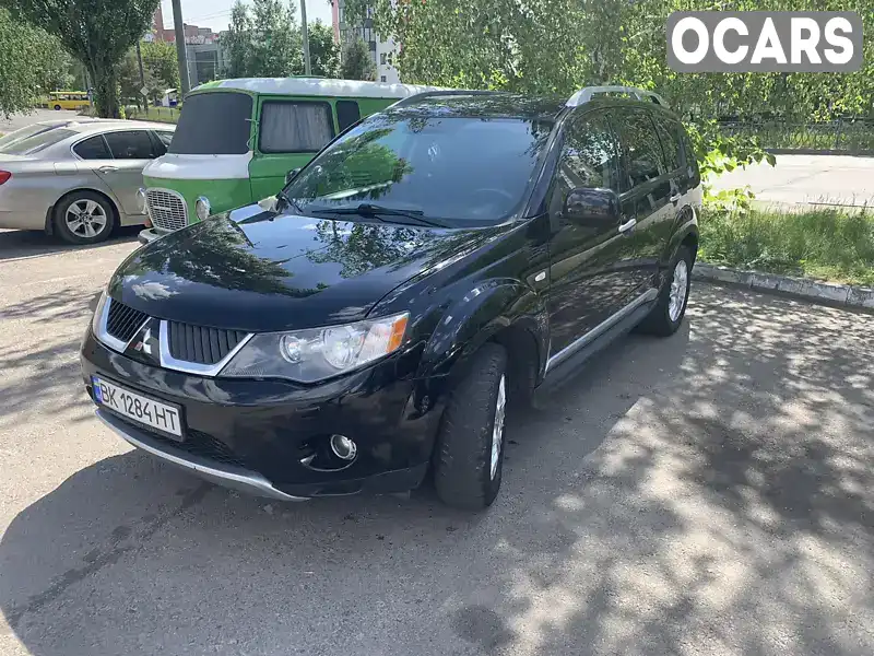 JMBXJCW8W9F506402 Mitsubishi Outlander 2009 Позашляховик / Кросовер 1.97 л. Фото 1