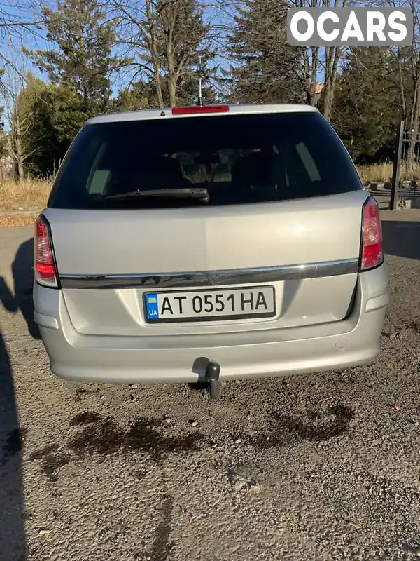 W0L0AHL35A2096014 Opel Astra 2010 Универсал 1.7 л. Фото 6