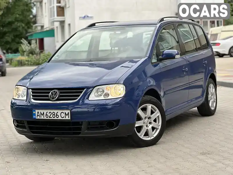 Мінівен Volkswagen Touran 2003 1.9 л. Ручна / Механіка обл. Житомирська, Звягель - Фото 1/21