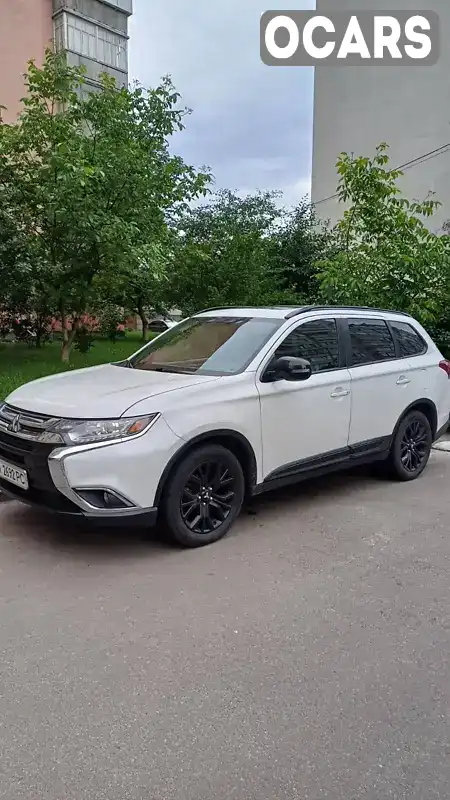 Внедорожник / Кроссовер Mitsubishi Outlander 2017 2.4 л. Автомат обл. Киевская, Вышневое - Фото 1/8