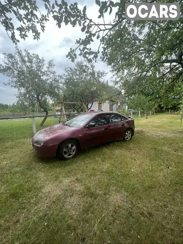 Хетчбек Mazda 323 1996 1.5 л. Ручна / Механіка обл. Житомирська, Звягель - Фото 1/7