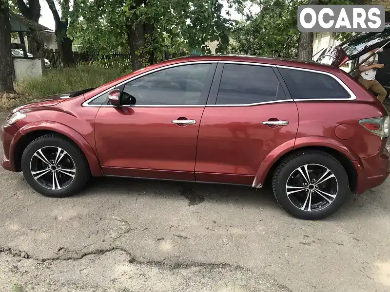 Позашляховик / Кросовер Mazda CX-7 2007 2.26 л. Автомат обл. Київська, Вишневе - Фото 1/8