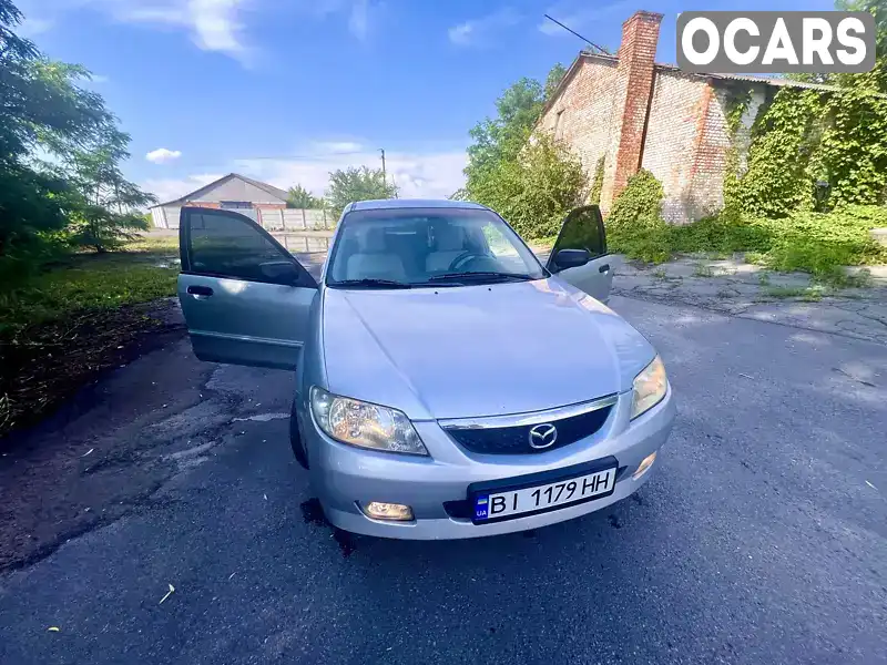 Хетчбек Mazda 323 2003 1.6 л. Ручна / Механіка обл. Кіровоградська, Олександрія - Фото 1/16