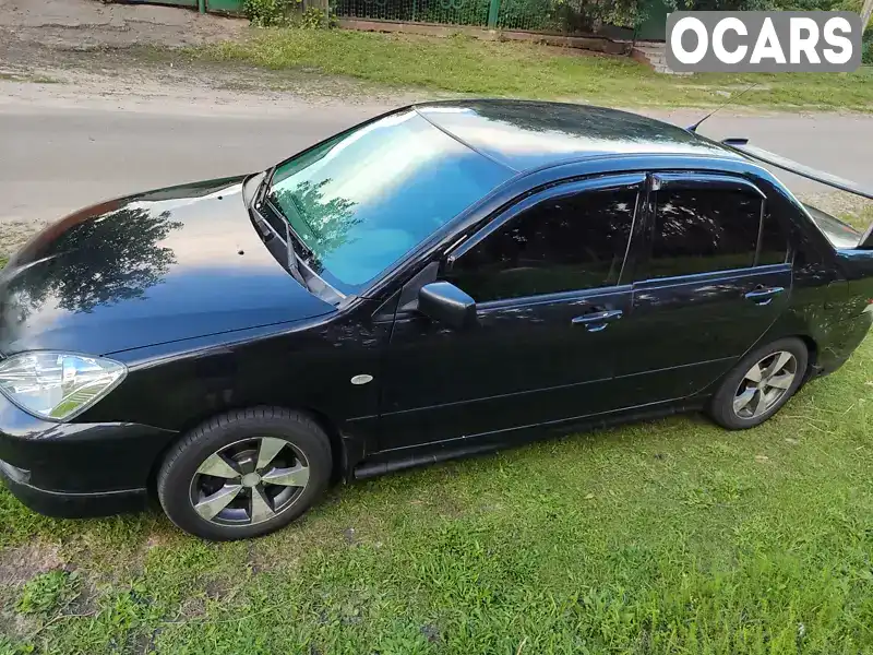 Седан Mitsubishi Lancer 2007 1.6 л. Ручна / Механіка обл. Київська, Богуслав - Фото 1/17