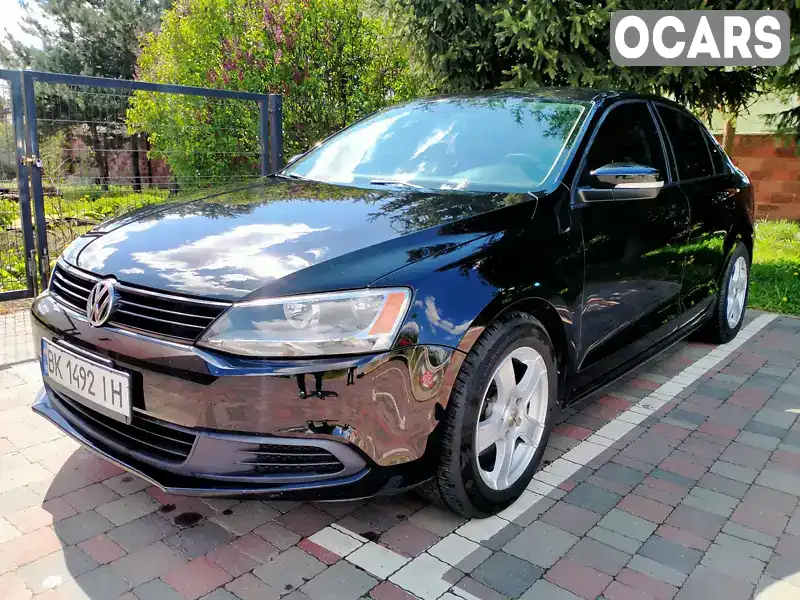 Седан Volkswagen Jetta 2013 1.8 л. Автомат обл. Рівненська, Рівне - Фото 1/19