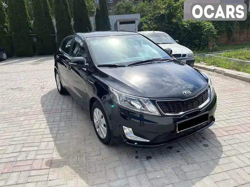 Седан Kia Rio 2013 1.59 л. обл. Хмельницька, Кам'янець-Подільський - Фото 1/17