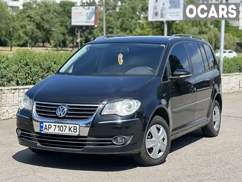 Мінівен Volkswagen Touran 2009 1.4 л. Ручна / Механіка обл. Запорізька, Запоріжжя - Фото 1/21