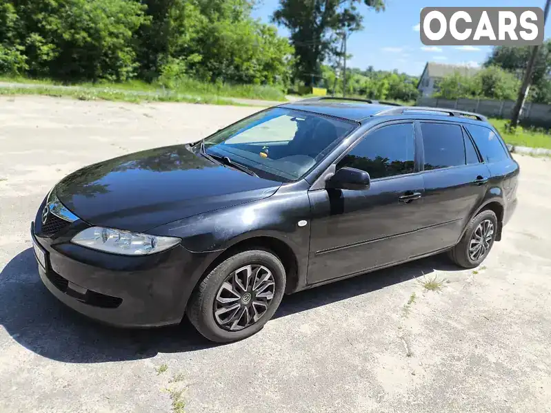 JMZGY19T201172497 Mazda 6 2004 Универсал 2 л. Фото 9