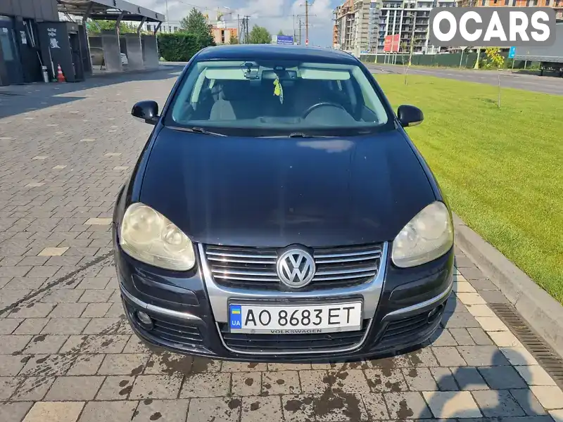 Седан Volkswagen Jetta 2009 1.9 л. Ручная / Механика обл. Закарпатская, Ужгород - Фото 1/3