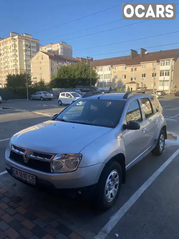 Позашляховик / Кросовер Renault Duster 2012 1.6 л. Ручна / Механіка обл. Київська, Вишневе - Фото 1/21