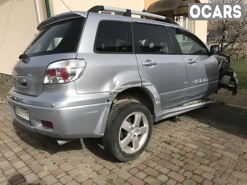 JMBXRCU5W8U001909 Mitsubishi Outlander 2008 Внедорожник / Кроссовер 2.38 л. Фото 2