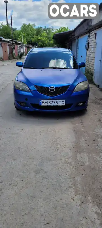 JMZBK14Z551145704 Mazda 3 2004 Хетчбек 1.6 л. Фото 1