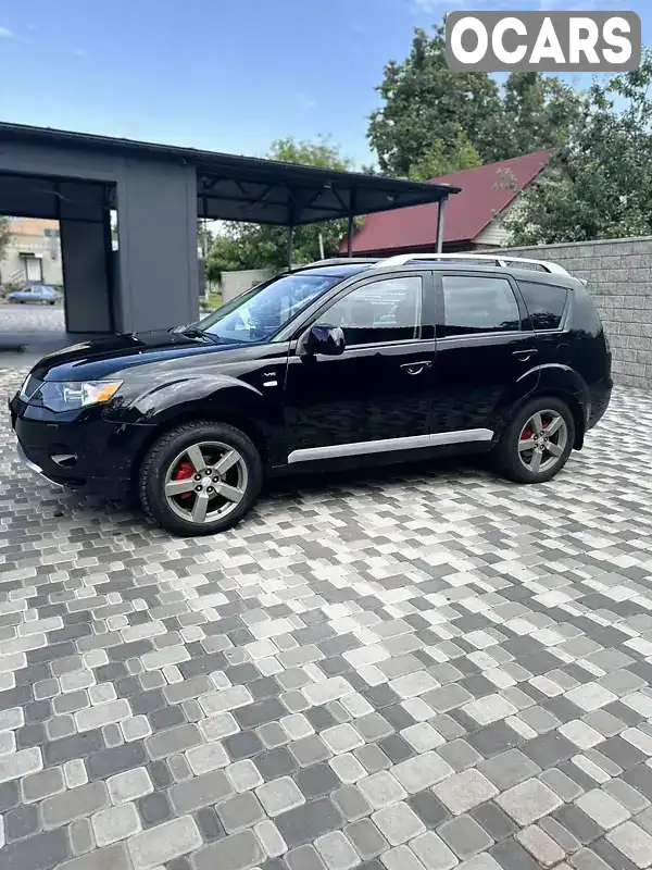 Внедорожник / Кроссовер Mitsubishi Outlander 2007 3 л. Автомат обл. Полтавская, Гадяч - Фото 1/11