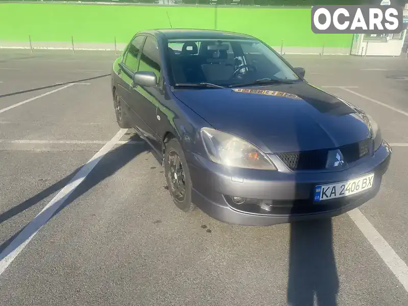 Седан Mitsubishi Lancer 2006 1.58 л. Ручна / Механіка обл. Київська, Вишневе - Фото 1/21