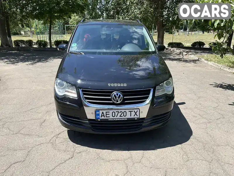 Мінівен Volkswagen Touran 2009 1.9 л. Автомат обл. Дніпропетровська, Кривий Ріг - Фото 1/19