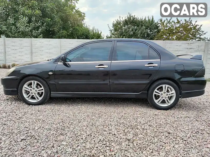 Седан Mitsubishi Lancer 2007 2 л. Автомат обл. Київська, Бориспіль - Фото 1/21