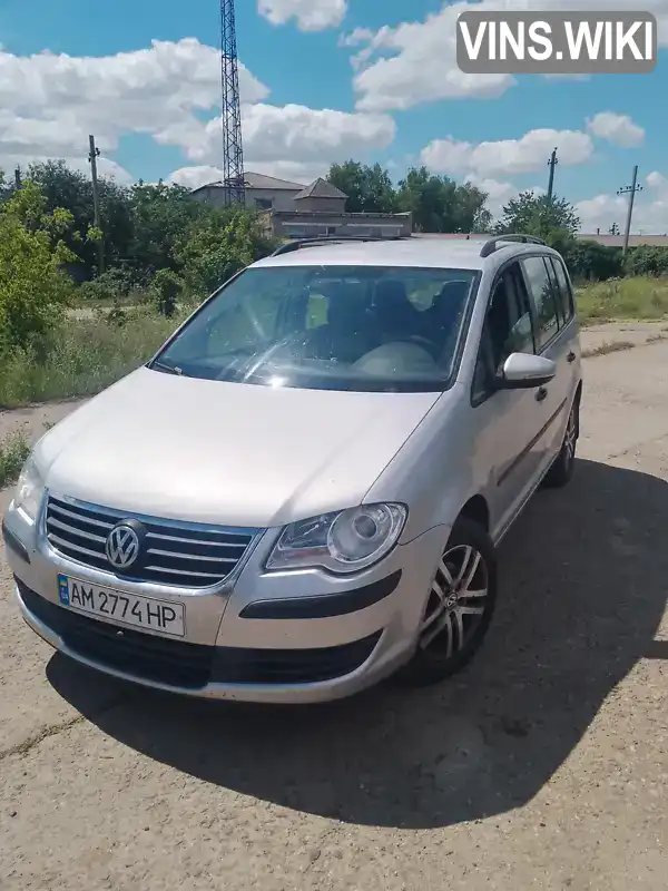 Мінівен Volkswagen Touran 2010 1.9 л. Ручна / Механіка обл. Одеська, Подільськ (Котовськ) - Фото 1/7