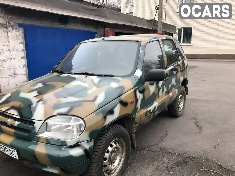 Позашляховик / Кросовер Chevrolet Niva 2004 1.69 л. Ручна / Механіка обл. Дніпропетровська, Кам'янське (Дніпродзержинськ) - Фото 1/9