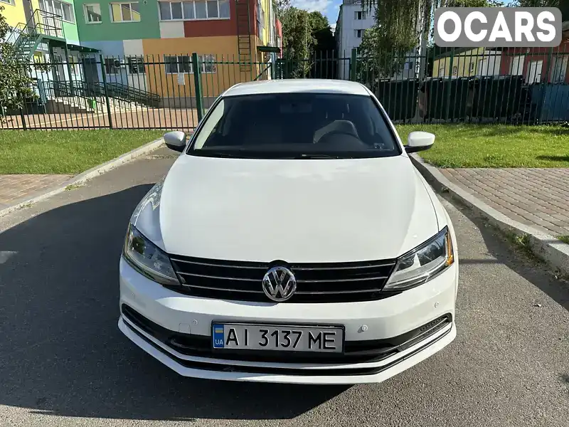 Седан Volkswagen Jetta 2016 1.4 л. Автомат обл. Київська, Вишневе - Фото 1/10