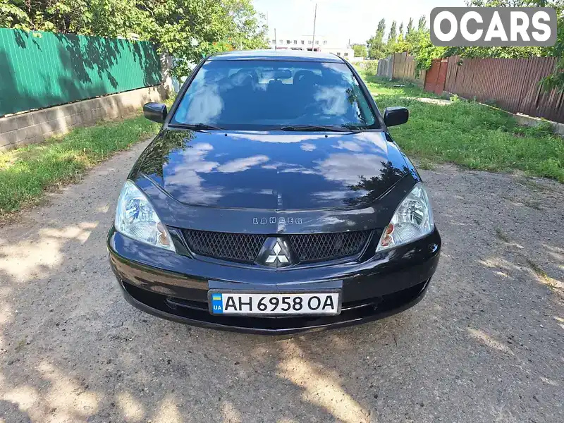 Седан Mitsubishi Lancer 2007 1.6 л. Ручна / Механіка обл. Львівська, Львів - Фото 1/21