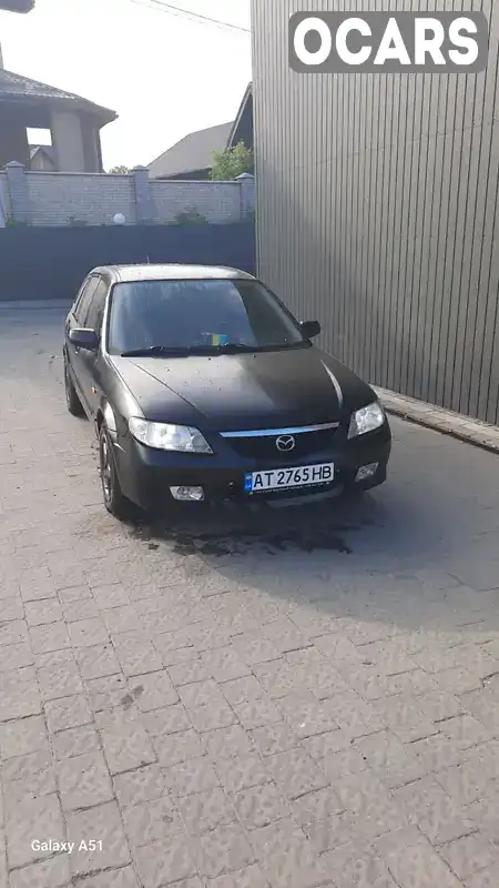 Седан Mazda 323 2001 2 л. Ручна / Механіка обл. Івано-Франківська, Івано-Франківськ - Фото 1/18