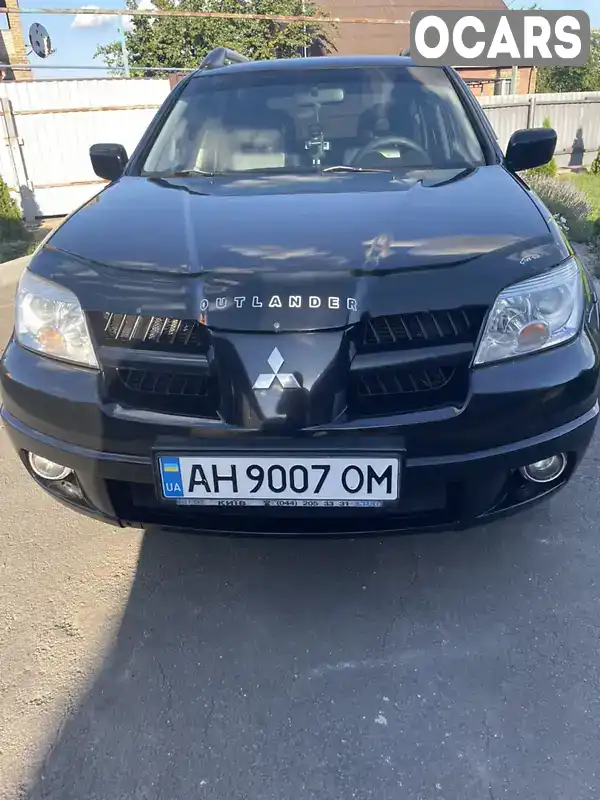 Позашляховик / Кросовер Mitsubishi Outlander 2009 2.38 л. Автомат обл. Донецька, Покровськ (Красноармійськ) - Фото 1/11