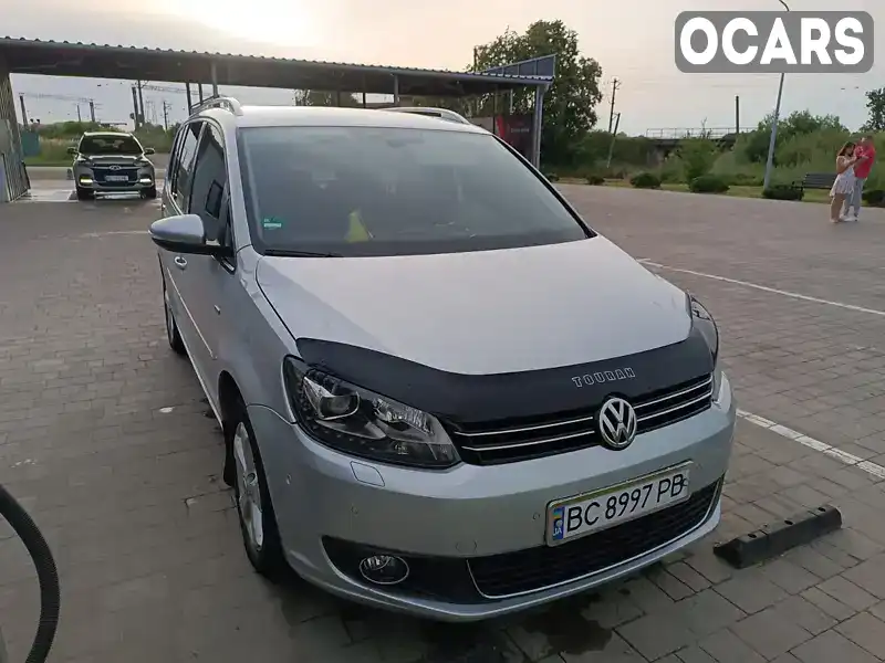 Мінівен Volkswagen Touran 2013 1.97 л. Автомат обл. Львівська, Мостиська - Фото 1/14