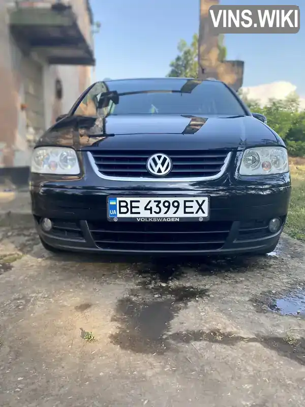 Мінівен Volkswagen Touran 2004 1.98 л. Ручна / Механіка обл. Миколаївська, Миколаїв - Фото 1/21