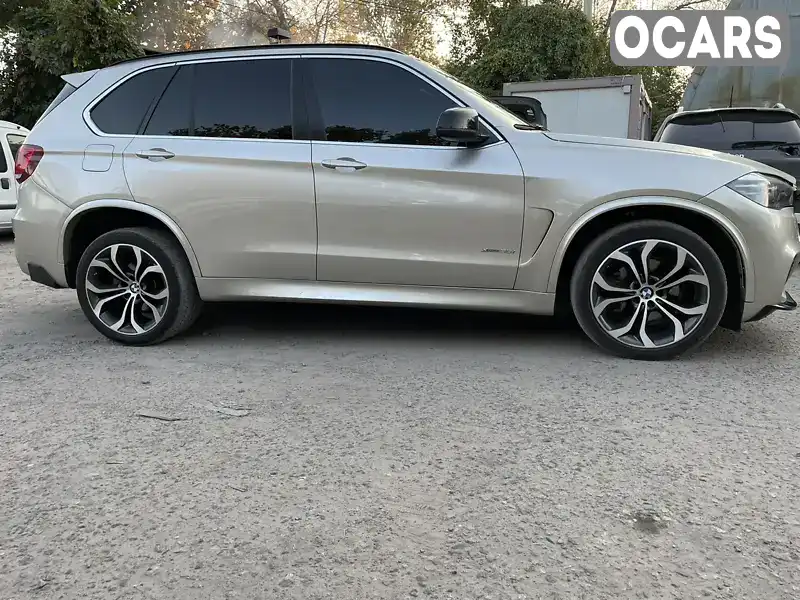 Позашляховик / Кросовер BMW X5 2015 2.98 л. Автомат обл. Київська, Вишневе - Фото 1/14