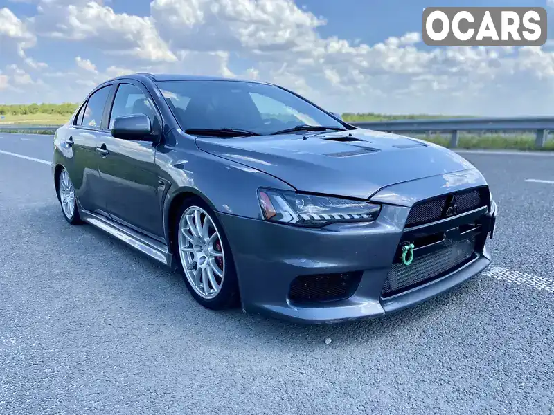 Седан Mitsubishi Lancer Evolution 2013 2 л. Робот обл. Днепропетровская, Днепр (Днепропетровск) - Фото 1/11