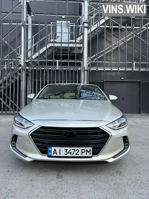 Седан Hyundai Elantra 2017 2 л. Автомат обл. Киевская, Вышневое - Фото 1/11