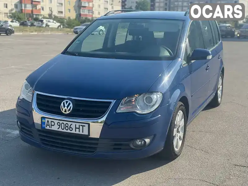 Мінівен Volkswagen Touran 2009 1.39 л. Автомат обл. Запорізька, Запоріжжя - Фото 1/9