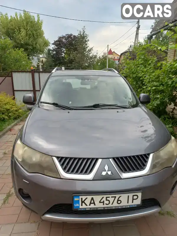 Внедорожник / Кроссовер Mitsubishi Outlander XL 2008 2.36 л. Автомат обл. Киевская, Киев - Фото 1/8