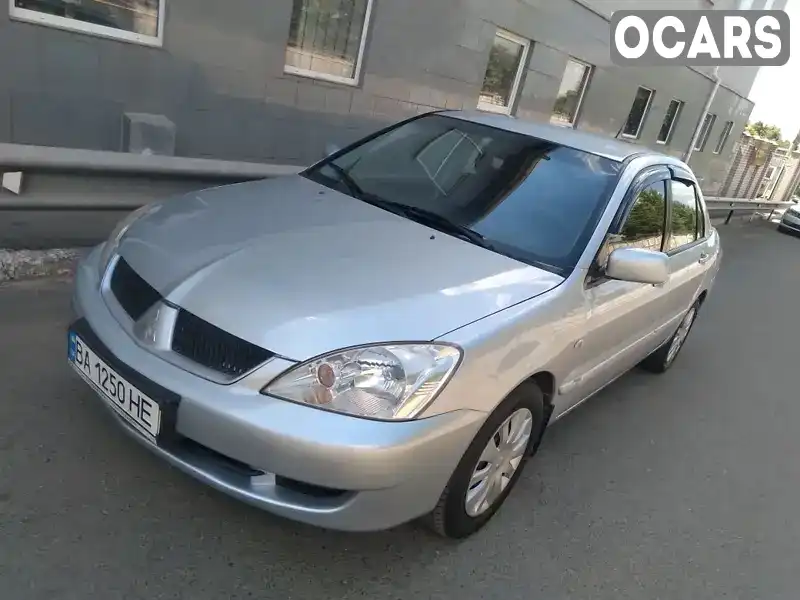 Седан Mitsubishi Lancer 2009 1.6 л. Ручная / Механика обл. Кировоградская, Кропивницкий (Кировоград) - Фото 1/21