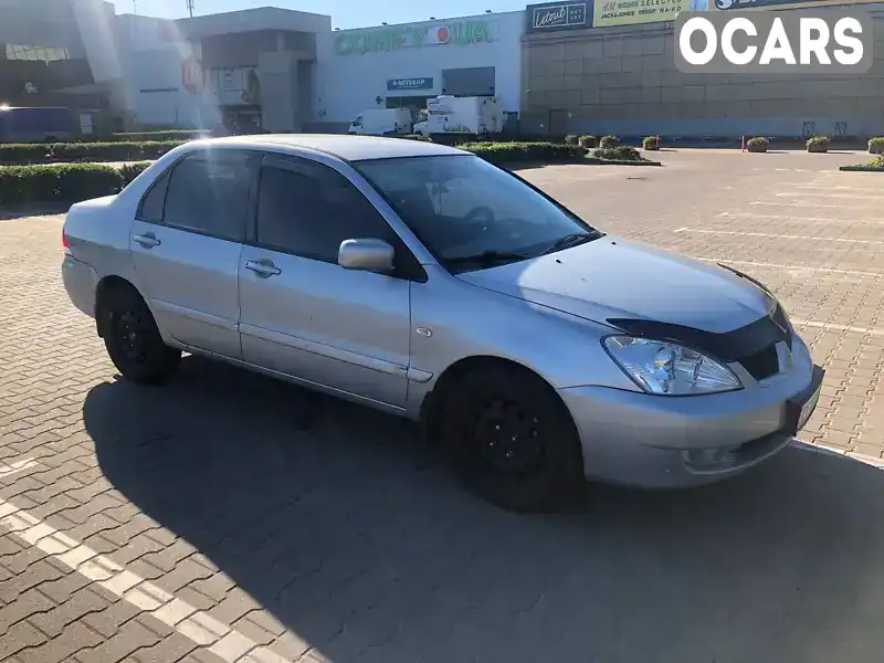 Седан Mitsubishi Lancer 2007 1.6 л. Ручна / Механіка обл. Житомирська, Житомир - Фото 1/21