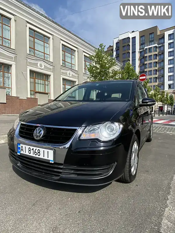 Минивэн Volkswagen Touran 2009 1.39 л. Автомат обл. Киевская, Белая Церковь - Фото 1/21