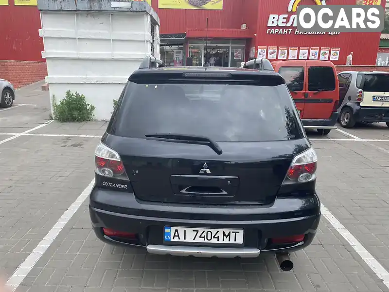 Позашляховик / Кросовер Mitsubishi Outlander 2006 2 л. Ручна / Механіка обл. Київська, Вишгород - Фото 1/6