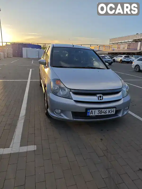 JHMRN38504C200070 Honda Stream 2004 Минивэн 2 л. Фото 1