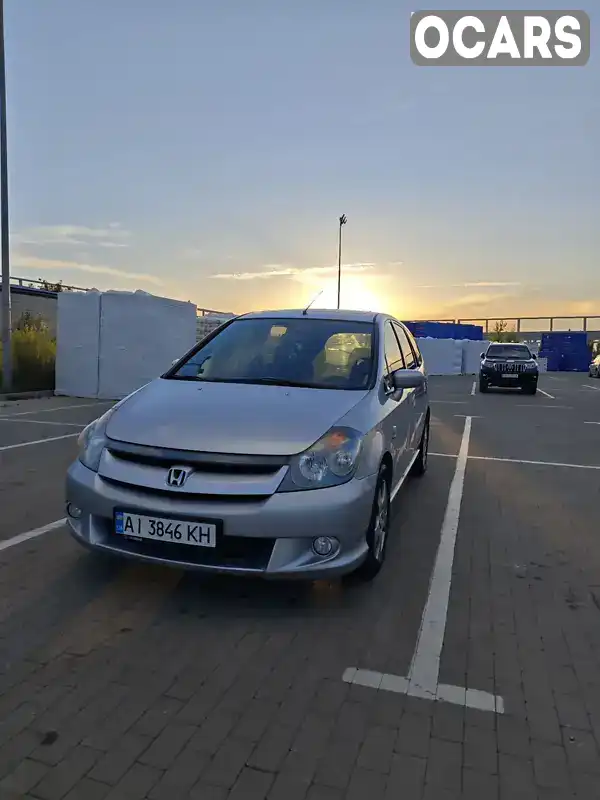 JHMRN38504C200070 Honda Stream 2004 Минивэн 2 л. Фото 2