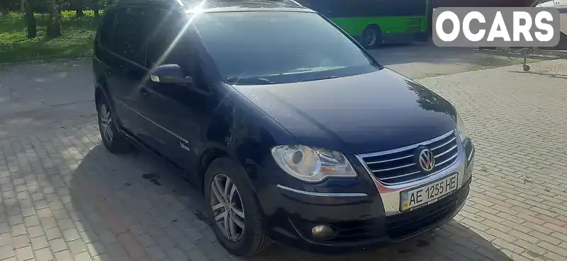 Мінівен Volkswagen Touran 2009 1.97 л. Типтронік обл. Дніпропетровська, Дніпро (Дніпропетровськ) - Фото 1/19