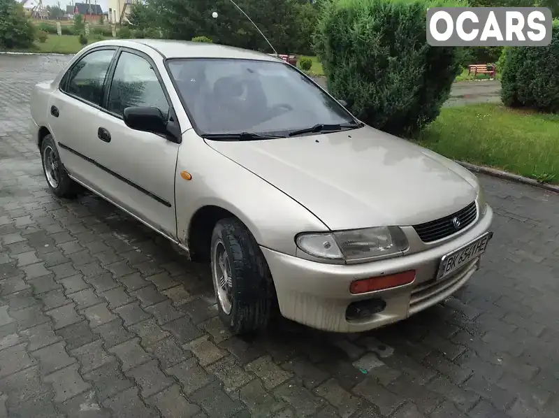 Седан Mazda 323 1996 1.49 л. Ручна / Механіка обл. Рівненська, Березне - Фото 1/9