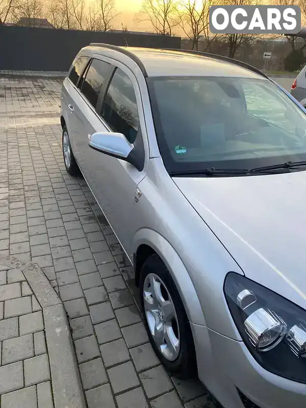 W0L0AHL35A2094464 Opel Astra 2010 Універсал 1.69 л. Фото 1